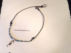 Necklace with Sterling silver seahorse, labradorite and leather.