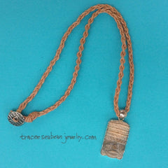 Jasper tiki necklace on tan leather